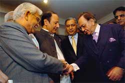 External Affairs Minister Natwar Singh with Pakistans Prime Minister Shujaat Hussain (second from left), Pak Finance Minister Shaukat Aziz and Foreign Minister Kursheed Kasuri at the inaugural meeting of Foreign Ministers of the SAARC in Islamabad