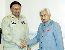 Pakistan President Pervez Musharraf greets Foreign Minister Natwar Singh in Islamabad on Friday. 