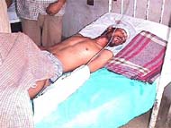 Amardeep of Lakhanmajra village undergoes treatment at the PGIMS, Rohtak, on Tuesday. His father, mother, wife and son were shot dead by unidentified gunmen in the village on Monday night. 