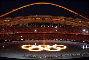 The Olympic rings are lit up as fireworks explode during the opening ceremony of the Athens  Olympic Gameson Friday. 