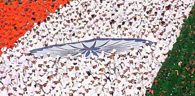 Schoolchildren dressed in the colours of the National Flag take part in the Independence Day function at the Red Fort in Delhi on Sunday.