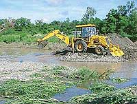 A portion of the Western Yamuna Canal, which was washed away on Wednesday morning, being repaired.