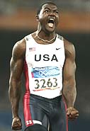 US sprinter Justin Gatlin exults after  winning the men's 100m final