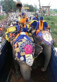 Sikh devotees at a procession which started from Sohal village near Amritsar on Thursday to participate in the 400th anniversary celebrations of first installation of Sri Guru Granth Sahib at Golden Temple