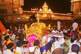 Sri Guru Granth Sahib being taken to Akal Takht for Sukhassan on a flower decked golden palanquin at the Golden Temple in Amritsar on Monday.