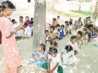 A student monitors a class in the absence of the teacher in Government Primary School, Jindra, near Moga.