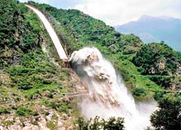 Water released through the Bypass chute, a safety device, of the 990 MW Dehar Power House