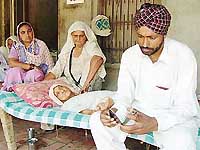 Jasbir Singh with his family members at Jalalabad East.