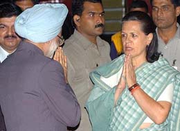 Prime Minister Manmohan Singh being greeted by Congress President Sonia Gandhi on his arrival at Palam Air Force Station in New Delhi on Monday.