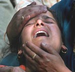 A relative of Mohammed Yusuf Bhat wails during his funeral at his residence in Mattan on Wednesday. 