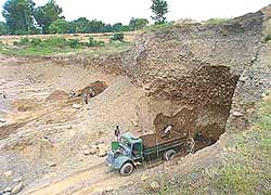 Illegal mining operation along River Chaki in Gurdaspur district.