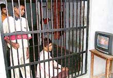 Asif and Altaf watch TV at Juvenile Jail in Faridkot on Friday.