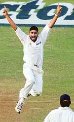 Harbhajan Singh celebrates Indias win over Australia in the fourth Test match in Mumbai on Friday. 