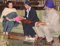 Members of the French Sikh delegation discuss the turban issue with Congress President Sonia Gandhi