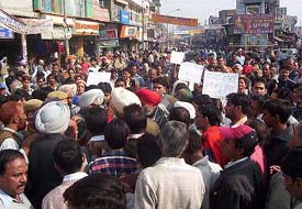 Residents scuffle with the police during the blockade on the Dalhousie road in protest against the dumping of waste near the Civil Hospital, Pathankot, on Tuesday.