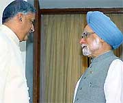 Prime Minister Manmohan Singh with his Pakistani counterpart Shaukat Aziz before a meeting at Hyderabad House in New Delhi on Wednesday.