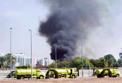 A video grab taken from Saudi television network Al-Ekhbaria shows smoke billowing from the US consulate in the Saudi Red Sea city of Jeddah on Monday. 