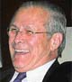 U.S. Secretary of Defence Donald Rumsfeld smiles from his car soon after his arrival at New Delhis airport on Wednesday. 