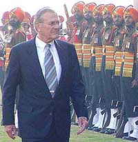 US Secretary of Defence Donald Rumsfeld inspects the guard of honour in New Delhi on Thursday.