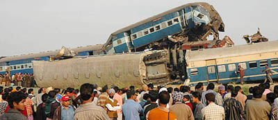 The Jammu Tawi Express climbs up a passenger train after a head-on collision in Mansar village near Mukerian on Tuesday. 