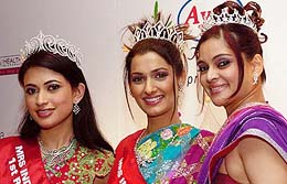 The winner of Mrs India World 2004 Jeevika Shah is flanked by first runners-up Arunima Datta and second runners-up Sapna Sharma after being crowned in Mumbai on Thursday night.