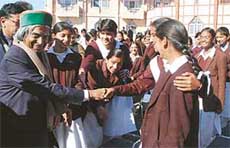 President A. P. J. Abdul Kalam shakes hand with schoolgirls at Peter Hoff in Shimla on Thursday.