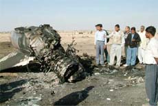 A view of the MIG-21 fighter jet of the Indian Air Force which crashed in a farm near Bikaner on Tuesday. 