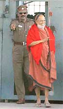 Kanchi Shankaracharya Jayendra Saraswati walks out of the Vellore  jail, after the Supreme Court granted him bail in a murder case, in Tamil Nadu on Tuesday. 