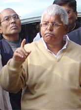 RJD leader Laloo Prasad Yadav talks to mediapersons after meeting Congress President Sonia Gandhi at 10 Janpath in New Delhi on Wednesday. 