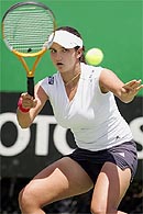Sania Mirza of India hits a return against Petra Mandula of Hungary in their womens singles second round match at the 2005 Australian Open Tennis Tournament in Melbourne on Wednesday. Sania won 6-2, 6-1.