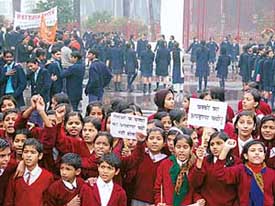 School children demonstrate in front of Raj Bhavan in Patna on Friday to protest against the kidnapping of students in Bihar.