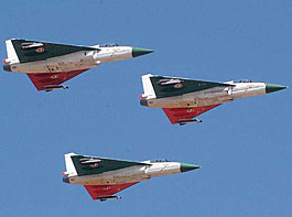 Three indigenously built light combat aircraft fly during the inauguration of the fifth Aero India Show-2005 at Yelhanka Air Force Station, near Bangalore, on Wednesday.