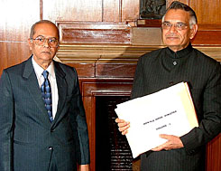 Justice G.T. Nanavati submits his report on the anti-Sikh riots of 1984 to Home Minister Shivraj Patil at North Block in New Delhi on Wednesday.