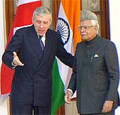 British Foreign Secretary Jack Straw gestures to his counterpart Natwar Singh prior to a meeting at Hyderabad House in New Delhi on Friday.