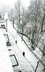 A snow covered road in Srinagar, on Saturday. The valley has been cut off from the rest of the world. 