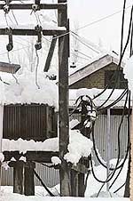 Heavy snow has clogged the transmission lines in the Jawahar Tunnel area of Jammu and Kashmir. 