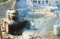 Liquor being distilled at Bhindi Saidan village on Monday. 