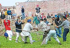 FREE-FOR-ALL: Activists of the SAD and the Congress clash at Chakk Bala village, 2 km from the Pakistan border, during the Ajnala byelection. 