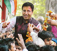Congress leader Randeep Singh Surjewala in a jubilant mood after defeating Haryana Chief Minister Om Prakash Chautala from the Narwana assembly constituency on Sunday.