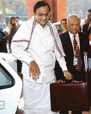 Finance Minister P. Chidambaram arrives at Parliament House to present the General Budget