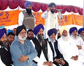 SAD (Longowal) chief Prem Singh Chandumajra, SAD (Ravi Inder) President Ravi Inder Singh and Lok Bhalai Party leaders at a political rally in Dharamkot on Monday.