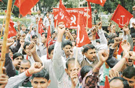 Employees raise anti-government slogans at a state convention of the Punjab State Ministerial Services Union in Ludhiana on Wednesday.