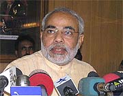 Mr Narendra Modi talks to mediapersons in Ahmedabad on Friday. 