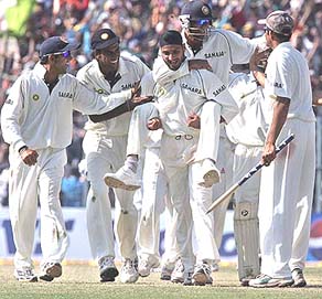 Indian cricketers celebrate after winning the second Test against Pakistan in Kolkata on Sunday