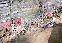 A view of the site where a boulder came crashing down on a kiosk, killing four persons, near Manali in the wee hours of Tuesday.