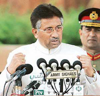 Pakistan President Pervez Musharraf speaks during the National Day parade in Islamabad on Wednesday.