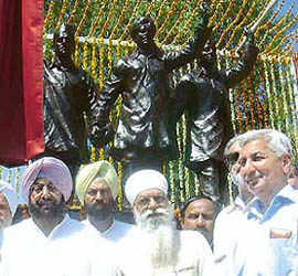 Punjab Chief Minister Amarinder Singh and other Congress leaders stand in front of the recently erected statues of Shaheed Bhagat Singh, Rajguru and Sukhdev at the National Martyrs Memorial near the Hussainiwala checkpost in Ferozepore on Wednesday. 