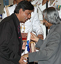 Film actor Shah Rukh Khan is presented the Padma Shri by President A.P.J. Abdul Kalam at an investiture ceremony at Rashtrapati Bhavan in New Delhi on Monday.