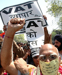 Traders demonstrate against VAT at Karol Bagh area in Delhi during the Bharat Bandh call on Tuesday. 