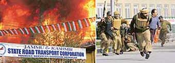 Flames touch the skies near the Jammu and Kashmir State Road Transport Corporation office at Srinagar